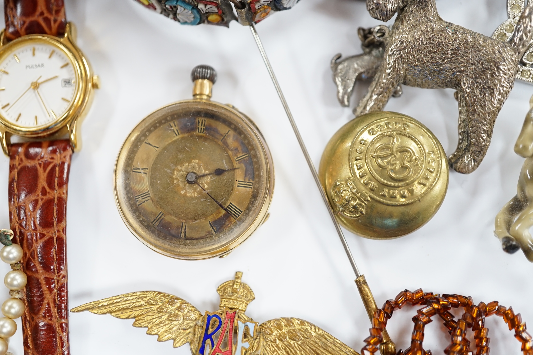 Two wrist watches, assorted badges and costume jewellery including paste set.